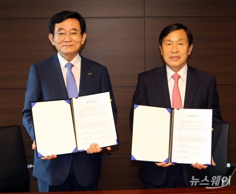 KCC글라스, 코리아오토글라스 흡수합병