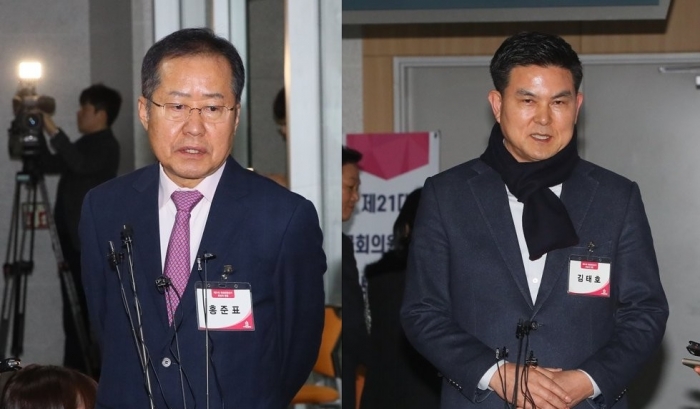 홍준표 전 자유한국당 대표와 김태호 전 경남지사. 사진=연합뉴스 제공